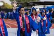 SMC graduates wave to their family and friends