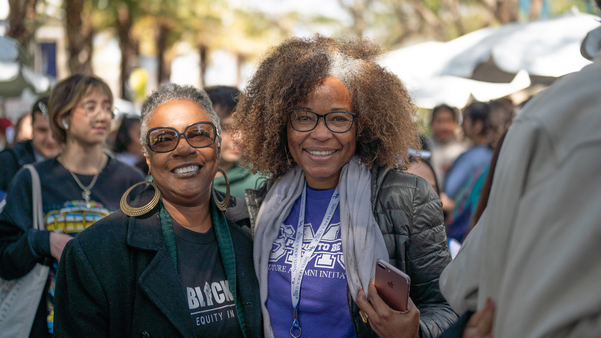 Counselor Linda Dis with a student