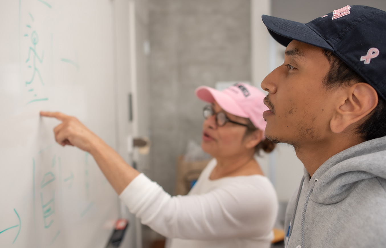 teacher and student in classroom