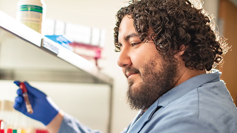 Student holding test tube