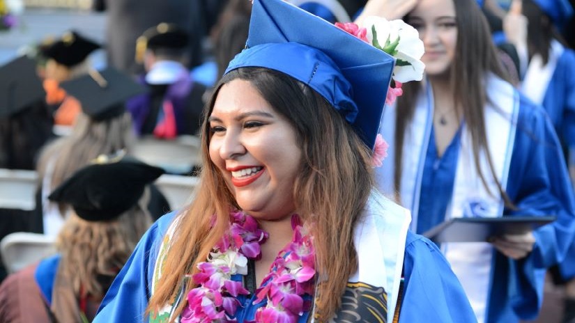 Female graduating student smiling