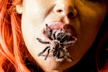 Spider in a woman's mouth
