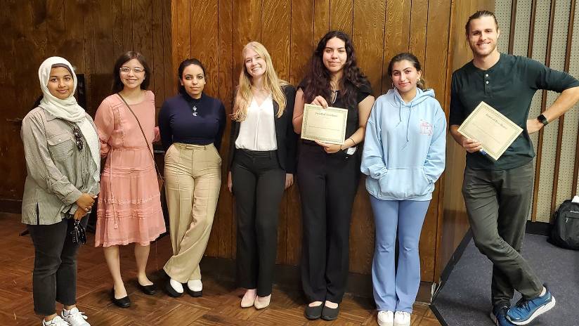 (L-R) SMC students/Debate Team members Sabah Nabiha, Angelina Sandoval, Klara Shawky, Shelby Coleman, Nadia Lopez, Darya Moghaddam, and Orion Young at the in-person Pacific Southwest Collegiate Forensics Association (PSCFA) “Warm Up” tournament held Oct. 1 at El Camino College. Nadia Lopez and Orion Young were awarded “Excellence” for winning three out of their four debate rounds. (Photo Credit: Nate Brown).