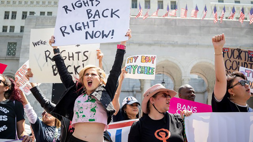 Part of PPAGLA Student Still Photographer of the Year Runner-Up Caylo Seals’ portfolio: Shira Yevin (left), founder of Gritty in Pink, an organization that advocates for gender equity and equality in the music industry during a protest organized by Women's March Foundation LA, Rise Up 4 Abortion Rights LA, and several other groups, outside Los Angeles City Hall, in Downtown Los Angeles, Calif., on Saturday, April 15, 2023. The protest was sparked after a federal judge in Texas invalidated F.D.A. approval of a common abortion drug, mifepristone.