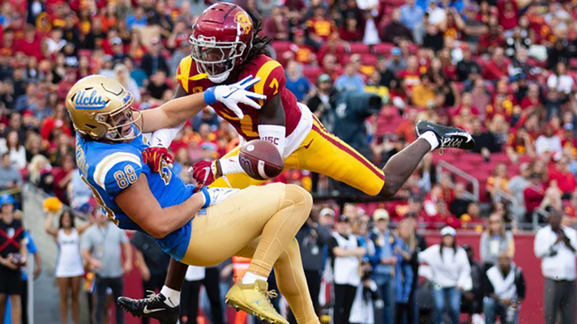 Caylo Seals also won honorable mention in the sports photo category for “Failed catch in endzone between rivals USC and UCLA”.