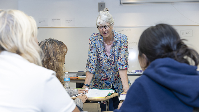 Marianne Borgardt explaining English to English language learners