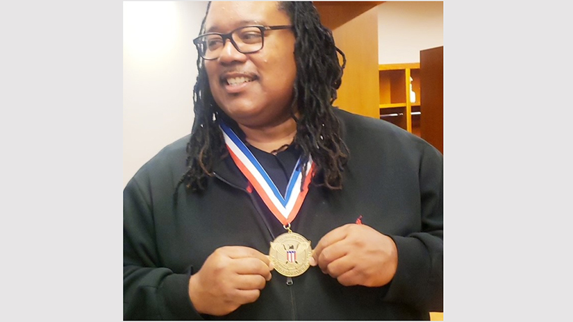 SMC Instructor Kevin Coleman with his Presidential Volunteer Service Award