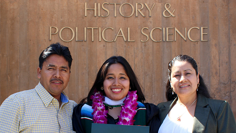 Christina with her parents at graduation from Nazarene University in 2014