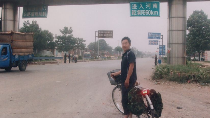Jing's dad on their bike trip