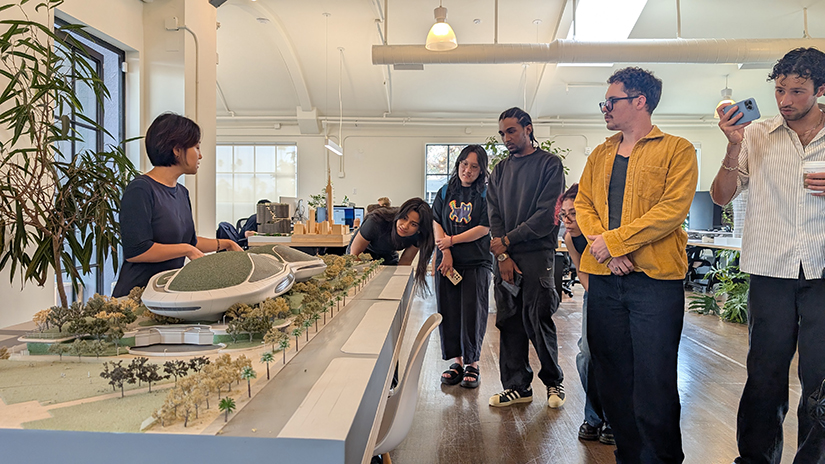 Students visit MAD Architects for industry feedback on their competition project. During an office tour, Flora Lee shows a model of the soon-to-open George Lucas Museum. (Left to Right) Marilyn Palacios, Youxian Luo, River Jordan, Mia Carreto, Beau Carter, Arya Rahmanian.