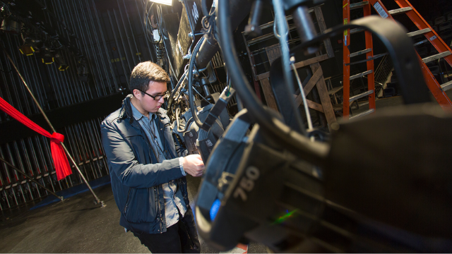 Student in film class