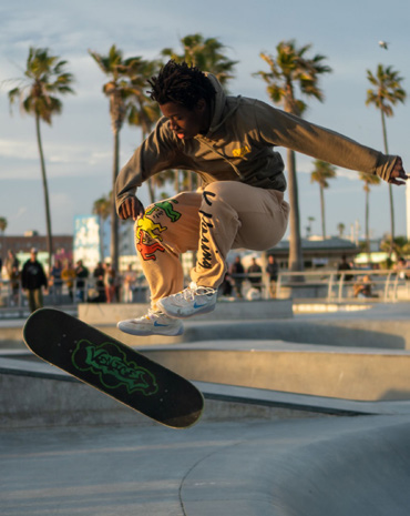 Skater jumping with skateboard