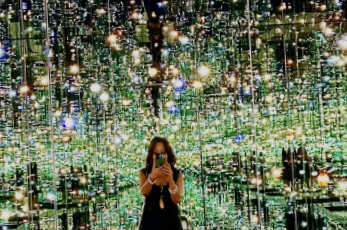 Person in room full of lights