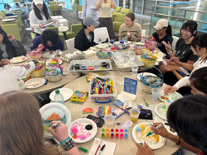 Students decorating eggs